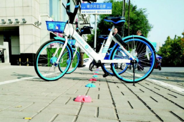 上海街头出现共享单车禁停神器—“蓝牙道钉”