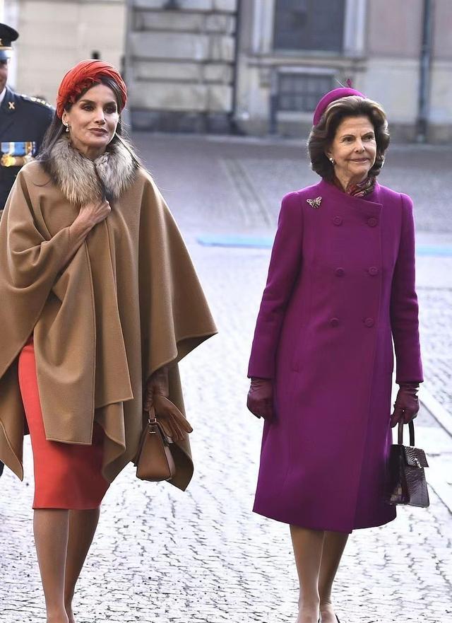 西班牙王后不怕冷，竟然用“斗篷”大衣配连衣裙，为王室形象拼了