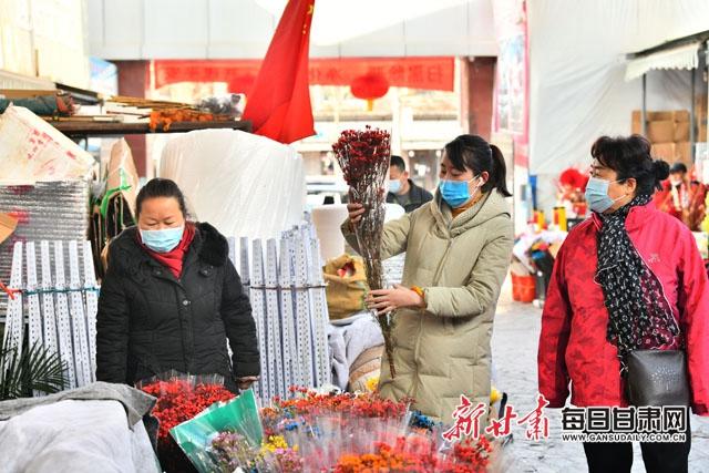 「找年味」花市红 鲜花俏 年味儿浓