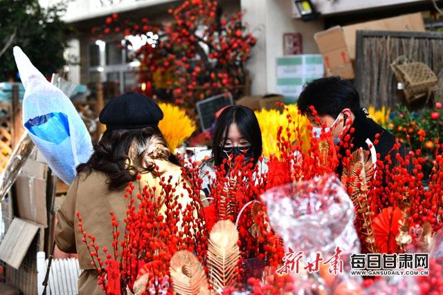 「找年味」花市红 鲜花俏 年味儿浓