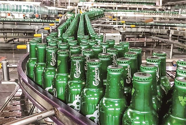 “智改数转”催动嘉士伯高质量发展，这里每小时可产出5万罐啤酒
